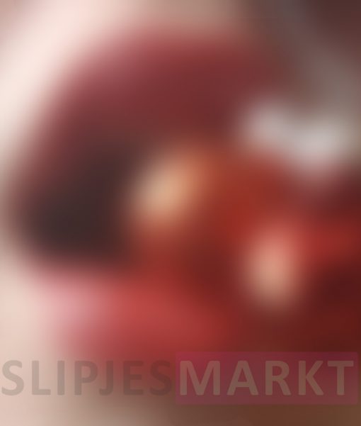 Foto's van mijn lippen met kerstballetjes