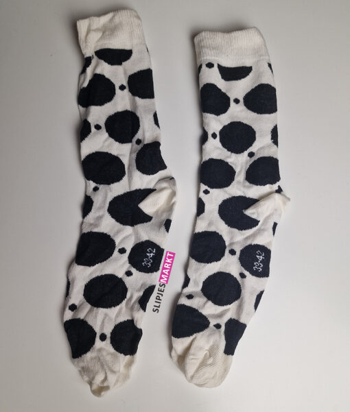 Witte sokken met grote zwarte stippen