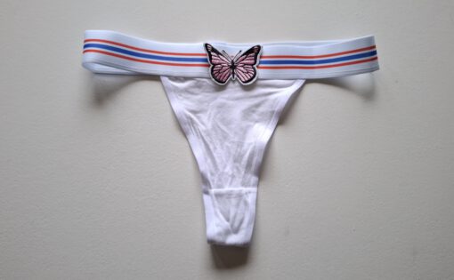 Witte string met vlinder