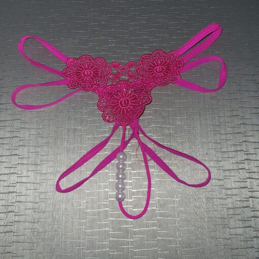 Roze string met parels.