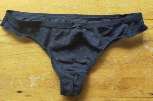 Zwarte string met stipjes