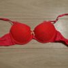 Roze BH met kant en een geel strikje